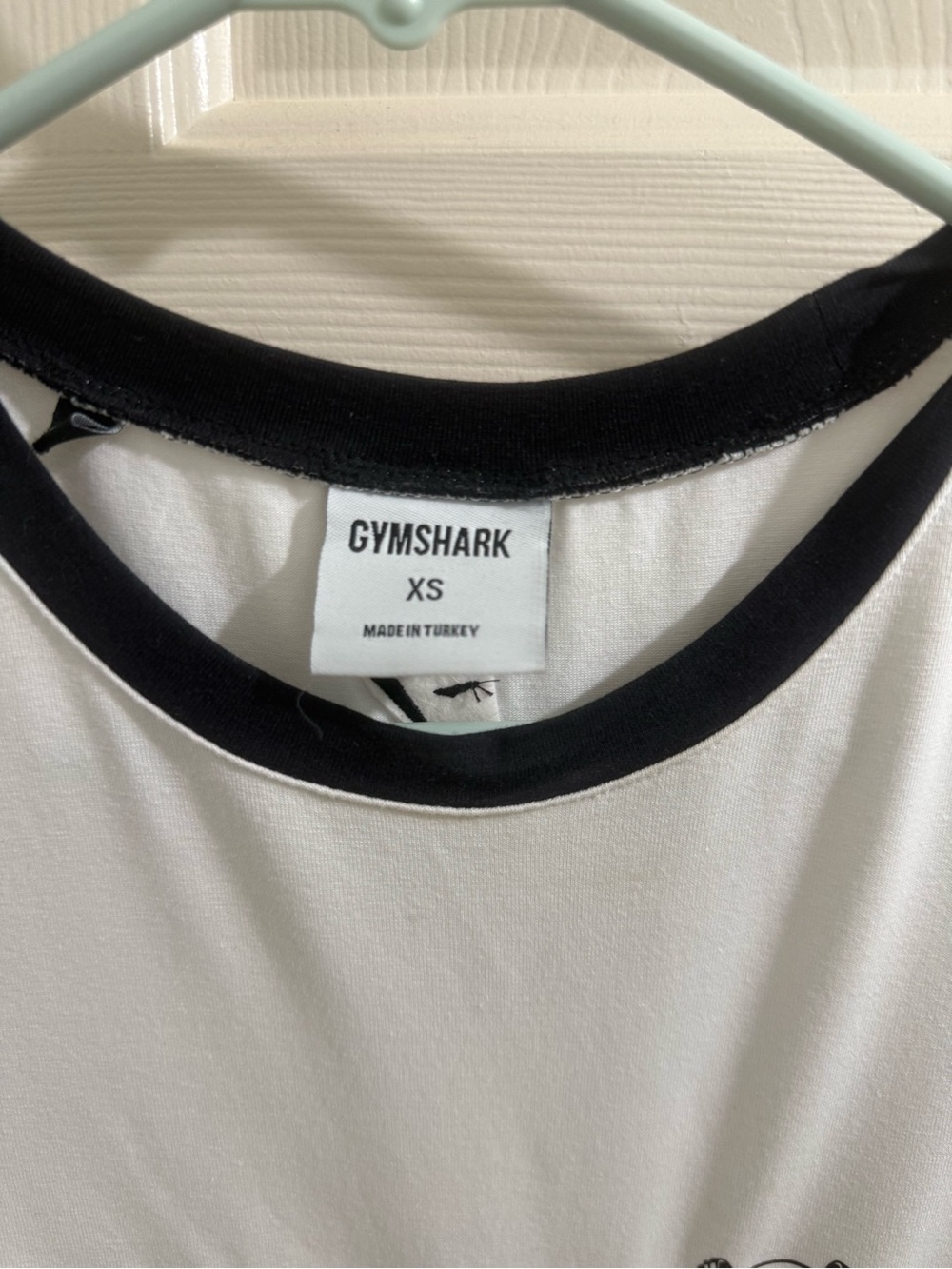 Gymshark White Tee with Black Ringer Trim and Barbell Motif - Picture 2 of 5